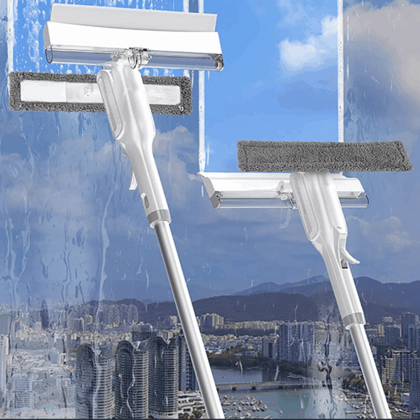 Bílá stěrka na okna s kloubovatým designem, určená pro snadné mytí velkých okenních ploch s pohledem na městskou krajinu v pozadí.