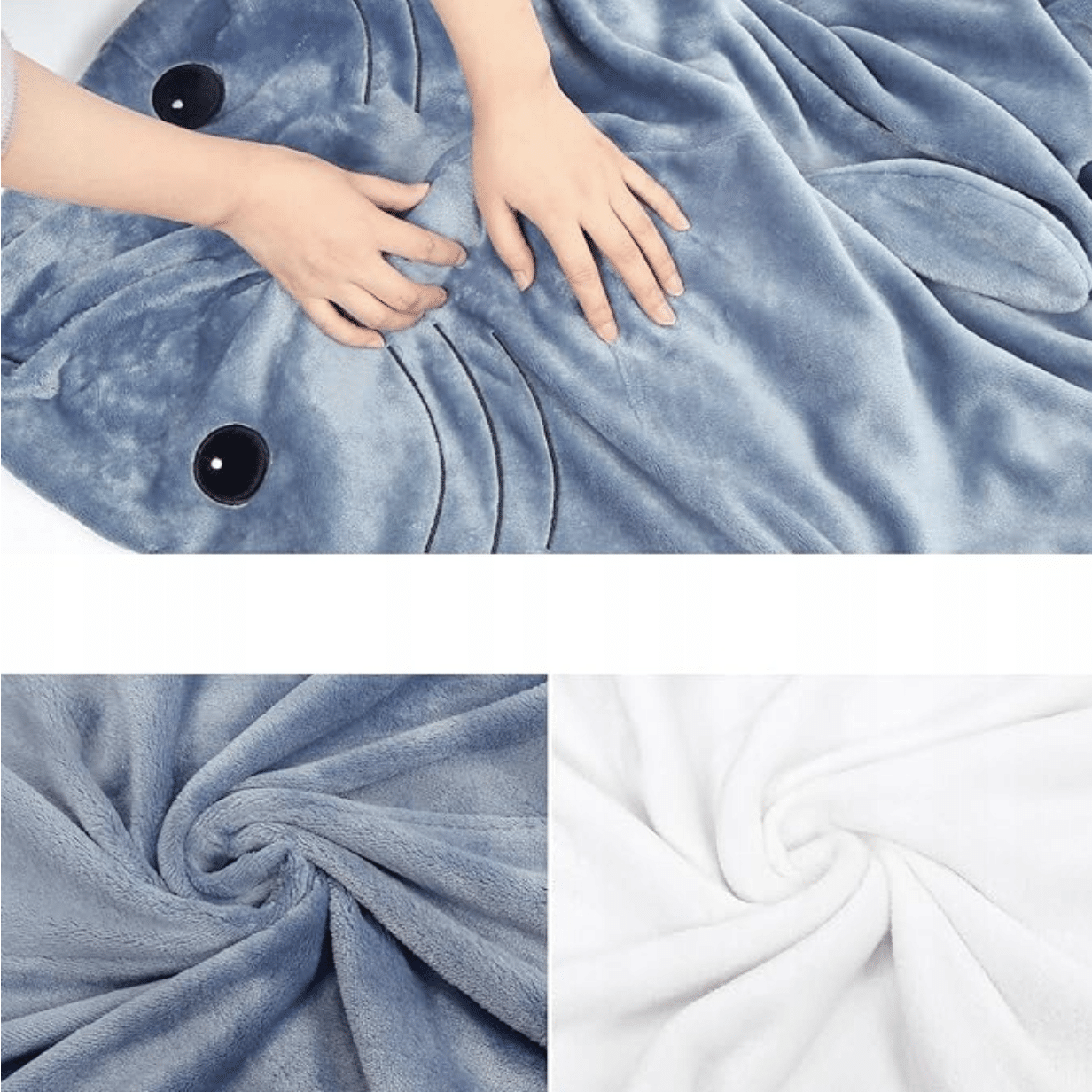 Modrá měkoučká deka ve tvaru žraloka s černýma očima, zachycená rukama v detailu textury froté látky v modré a bílé barvě.