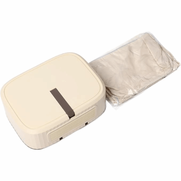 Béžový elektrický přístroj s plastovým ochranným obalem, pravděpodobně přenosná chladnička nebo ohřívač potravin.